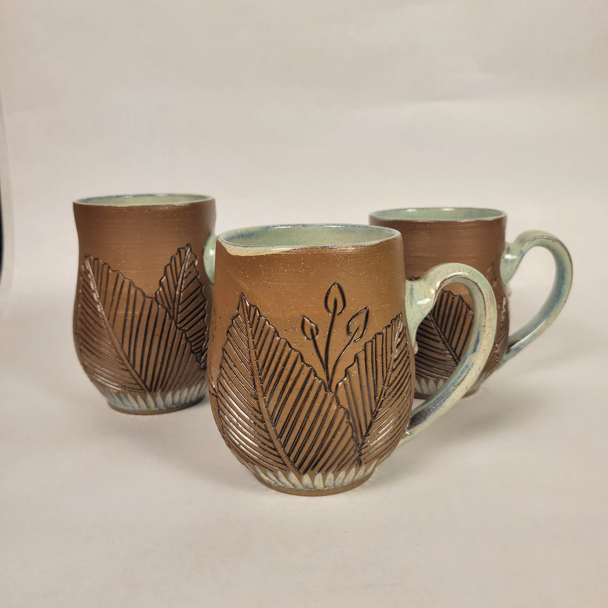 Sage and Blue Glazed Mug with Raw  Clay Belly